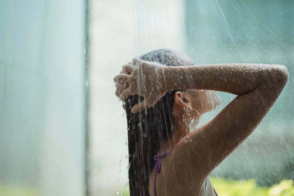 Woman in cold shower