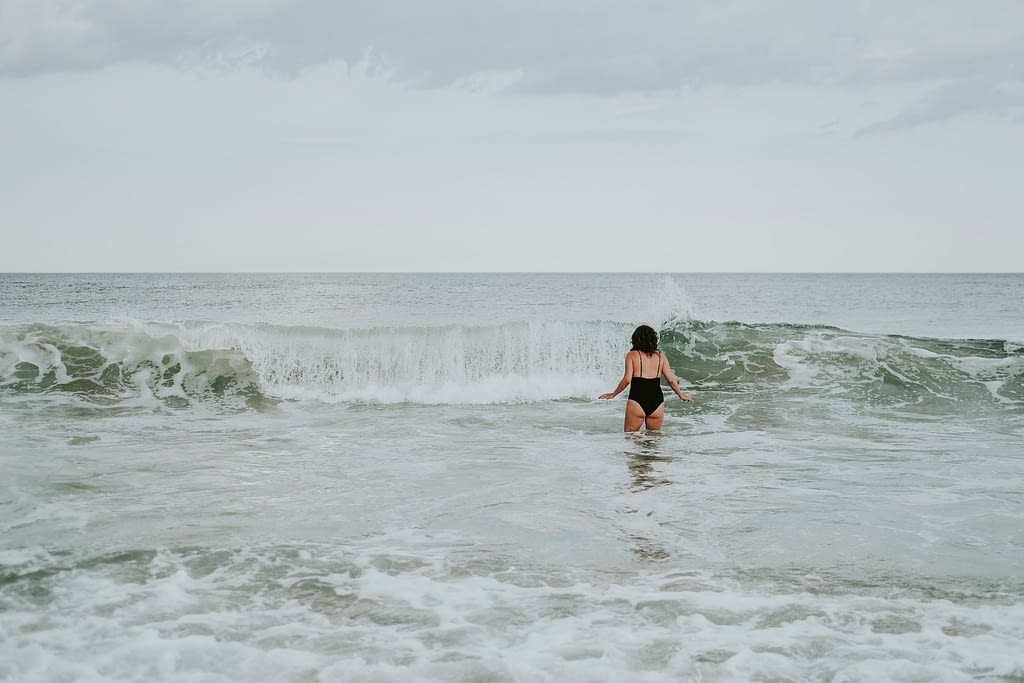 Woman going into the sea