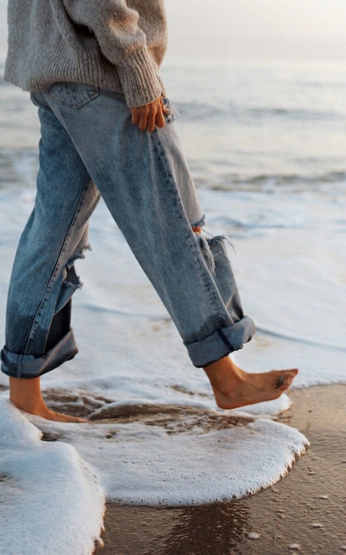 walking barefoot on the beach